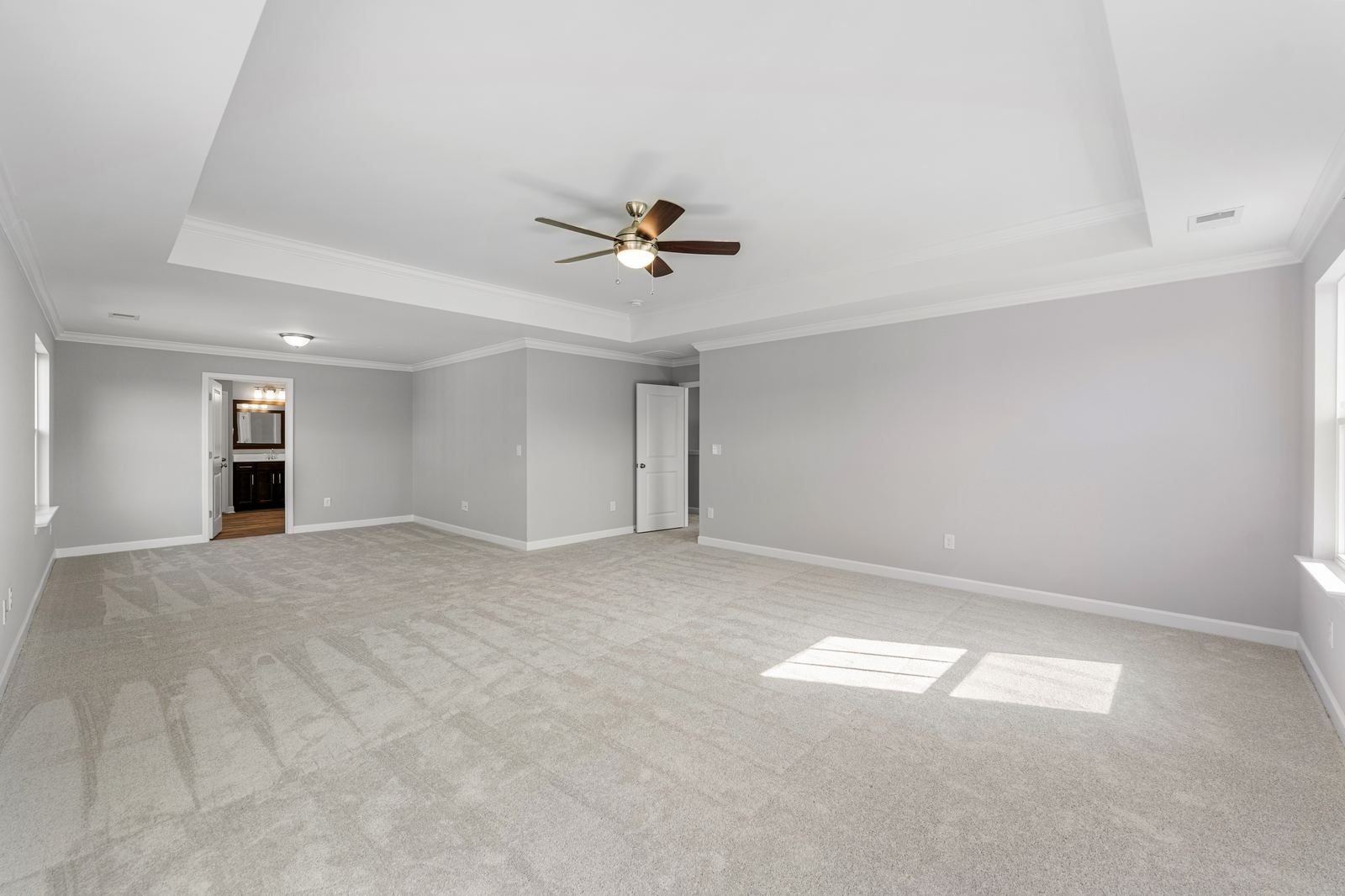AI + human real estate photo editing of a bedroom interior after