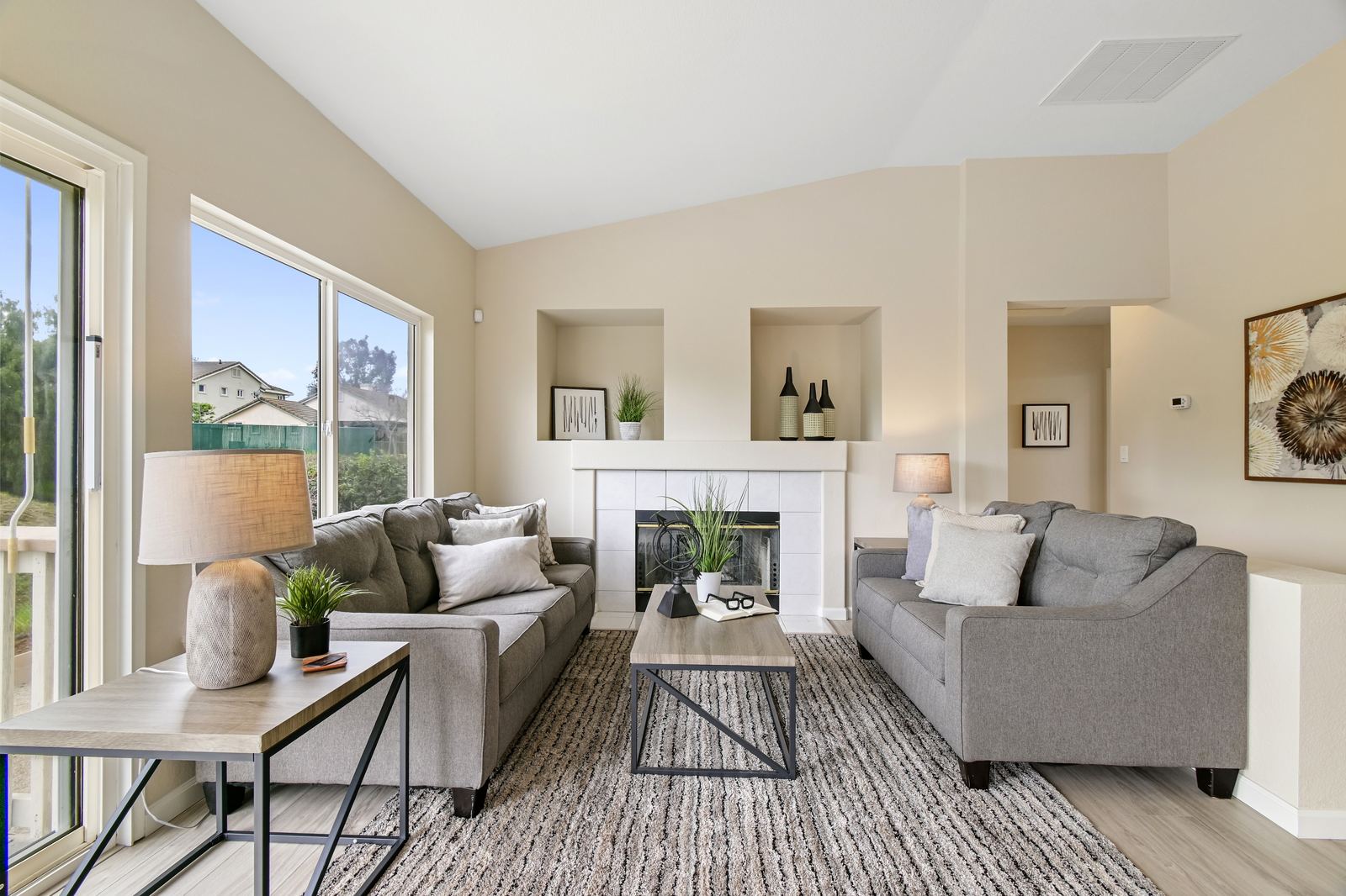 AI + human real estate photo editing of a living room after