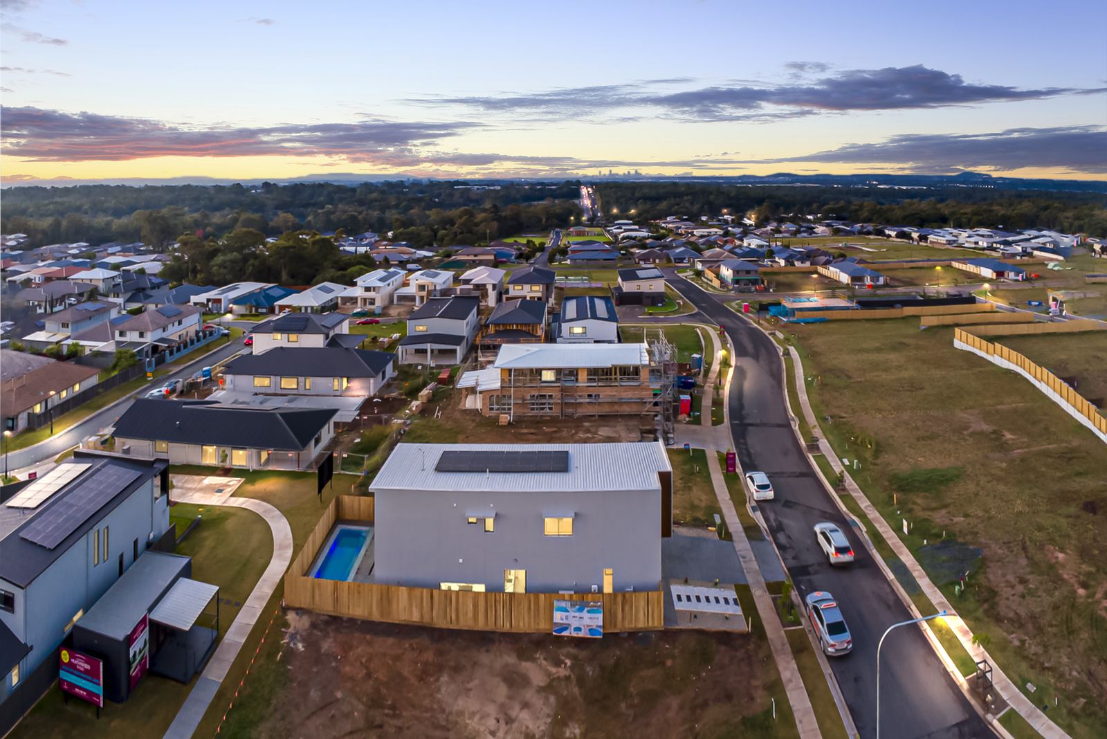 Day to dusk conversion of an aerial estate photo after