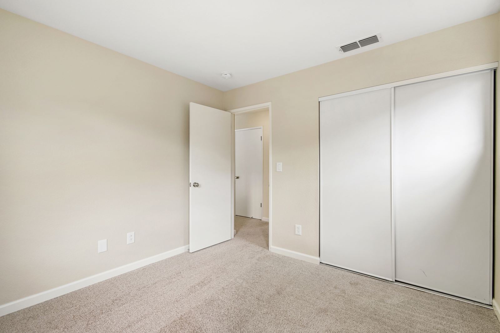 High-end manual real estate photo editing of a living room after